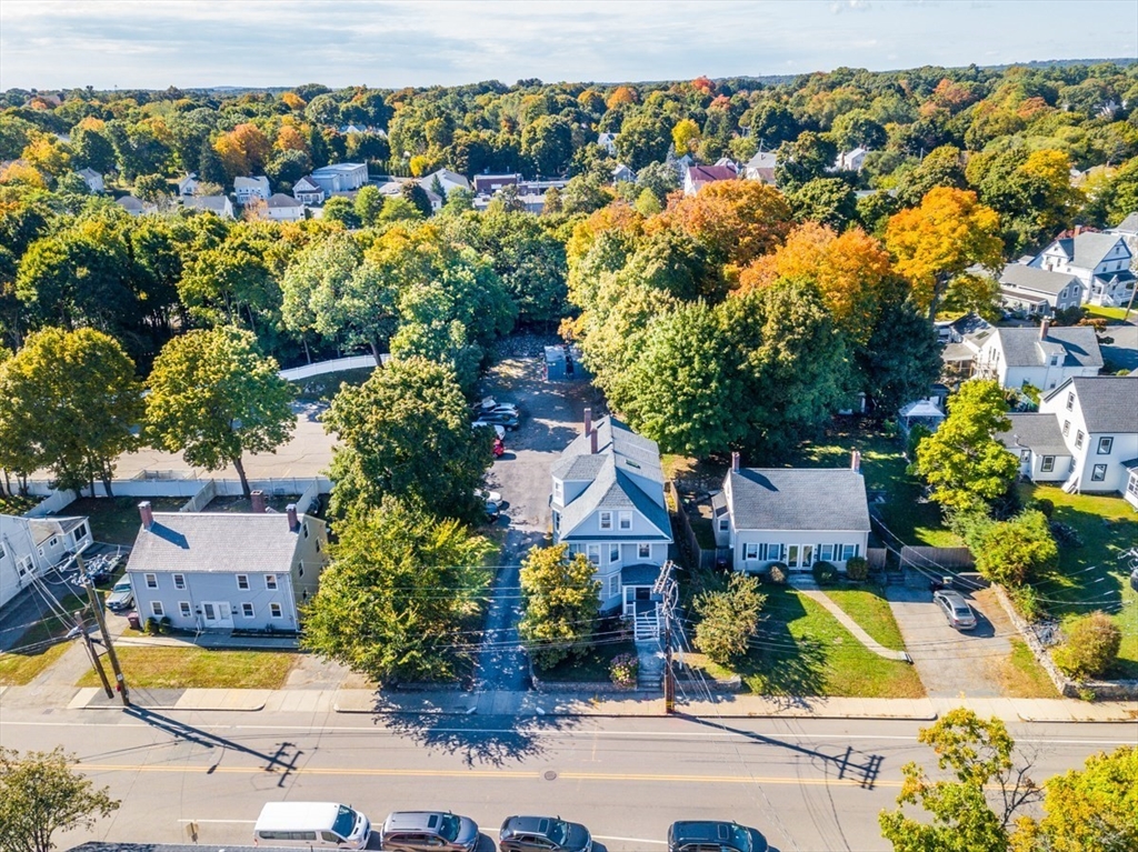 69 Milton Street Dedham, MA 02026 - Photo 25 of 33 an aerial view of residential houses and car parked