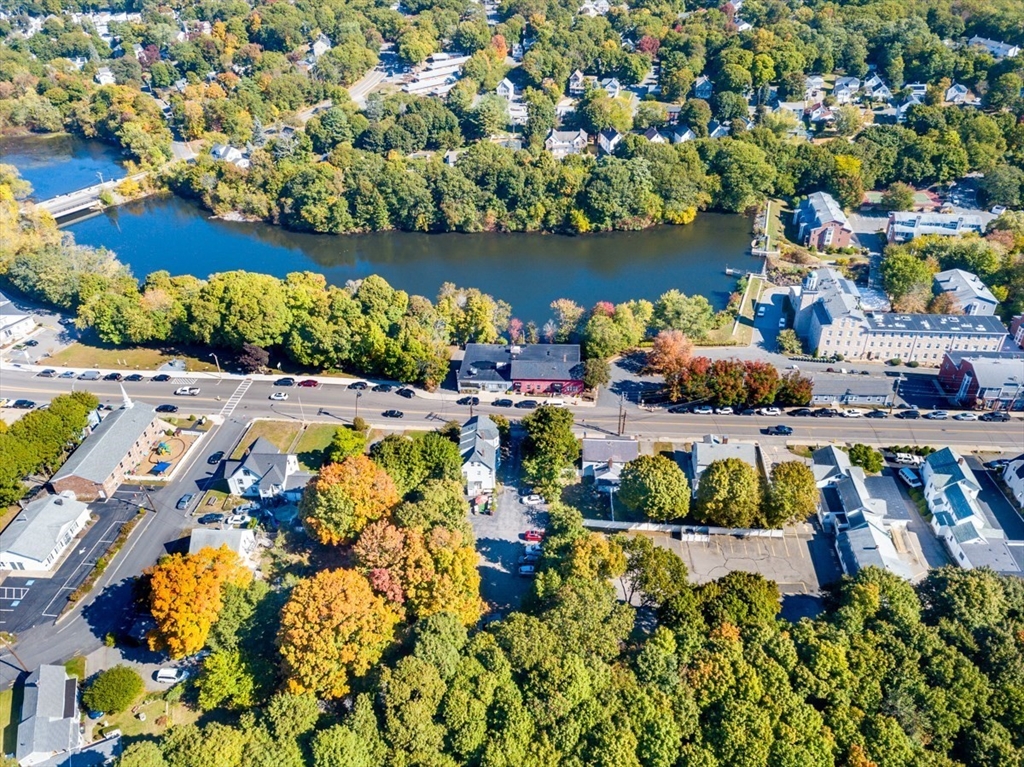 69 Milton Street Dedham, MA 02026 - Photo 5 of 33 a view of a lake with houses