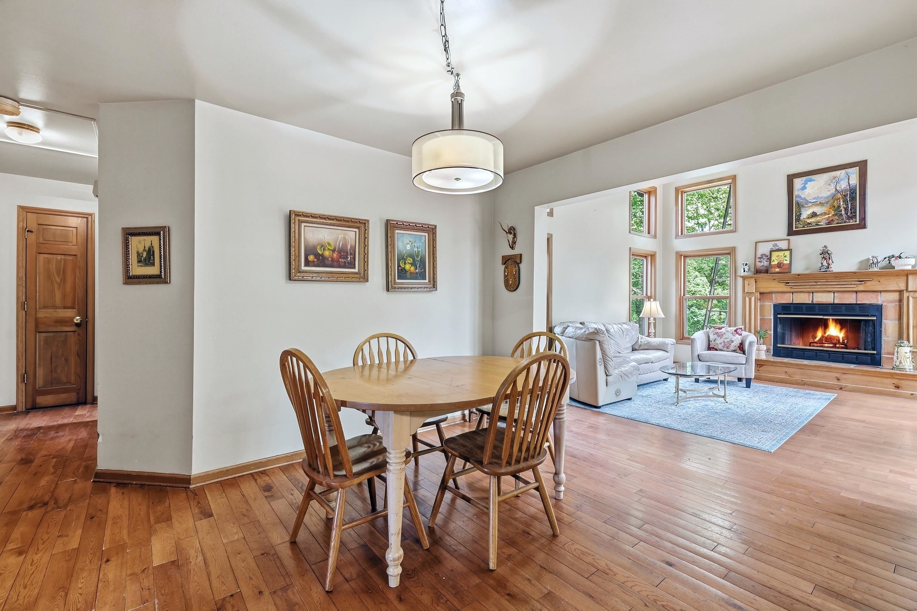 13 Signal Point Lane Galena, IL 61036 - Photo 14 of 47 a view of a dining room with furniture window and wooden floor