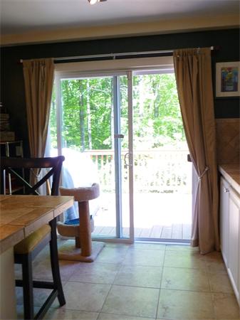 408 Florence Road Northampton, MA 01062 - Photo 12 of 30 a dining room with furniture and a floor to ceiling window