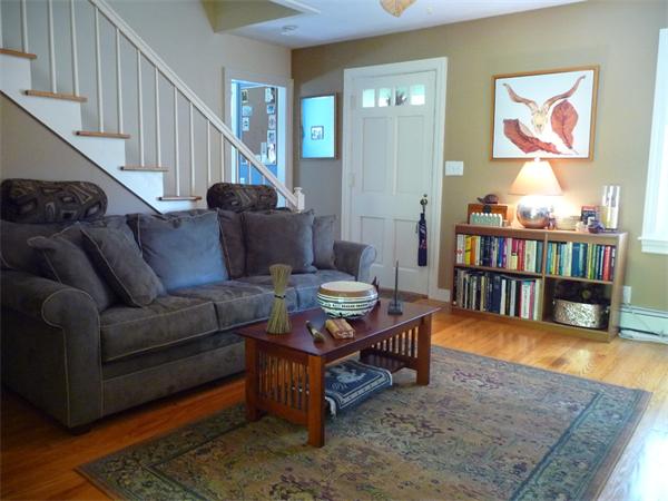 408 Florence Road Northampton, MA 01062 - Photo 13 of 30 a living room with furniture and a book shelf