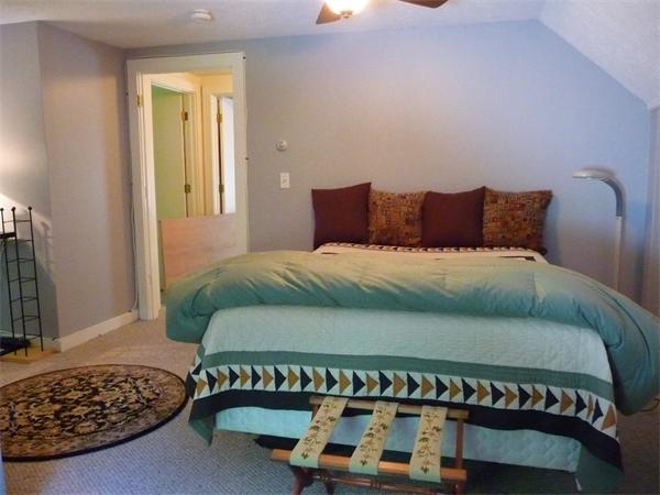 408 Florence Road Northampton, MA 01062 - Photo 23 of 30 a bedroom with a bed and a window