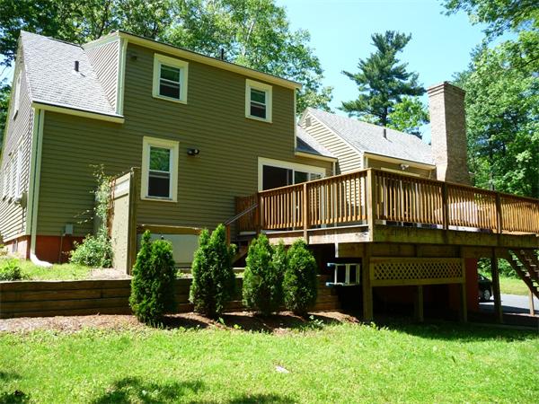 408 Florence Road Northampton, MA 01062 - Photo 5 of 30 a front view of a house with a yard