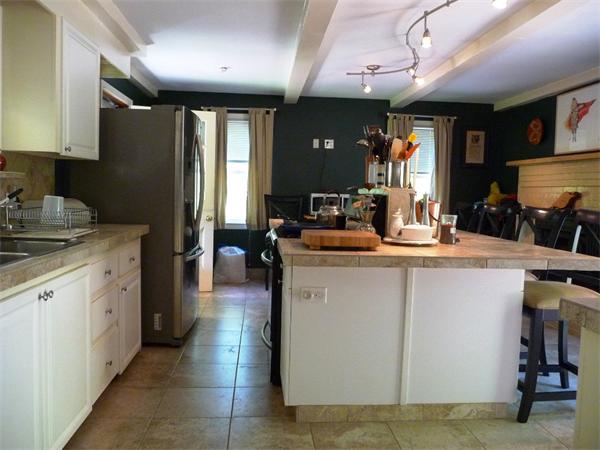 408 Florence Road Northampton, MA 01062 - Photo 8 of 30 a kitchen with sink cabinets and outdoor view