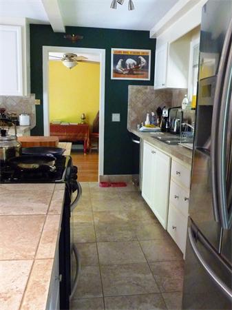 408 Florence Road Northampton, MA 01062 - Photo 10 of 30 a kitchen with stainless steel appliances granite countertop a refrigerator and a stove