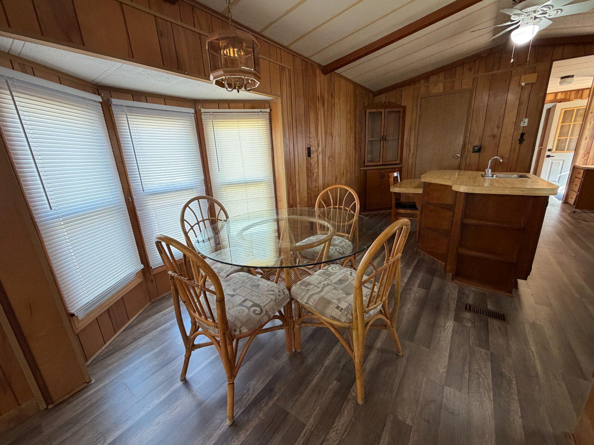417 Captain Smith Lane Buena, NJ 08310 - Photo 11 of 25 a view of a dining room with furniture and wooden floor