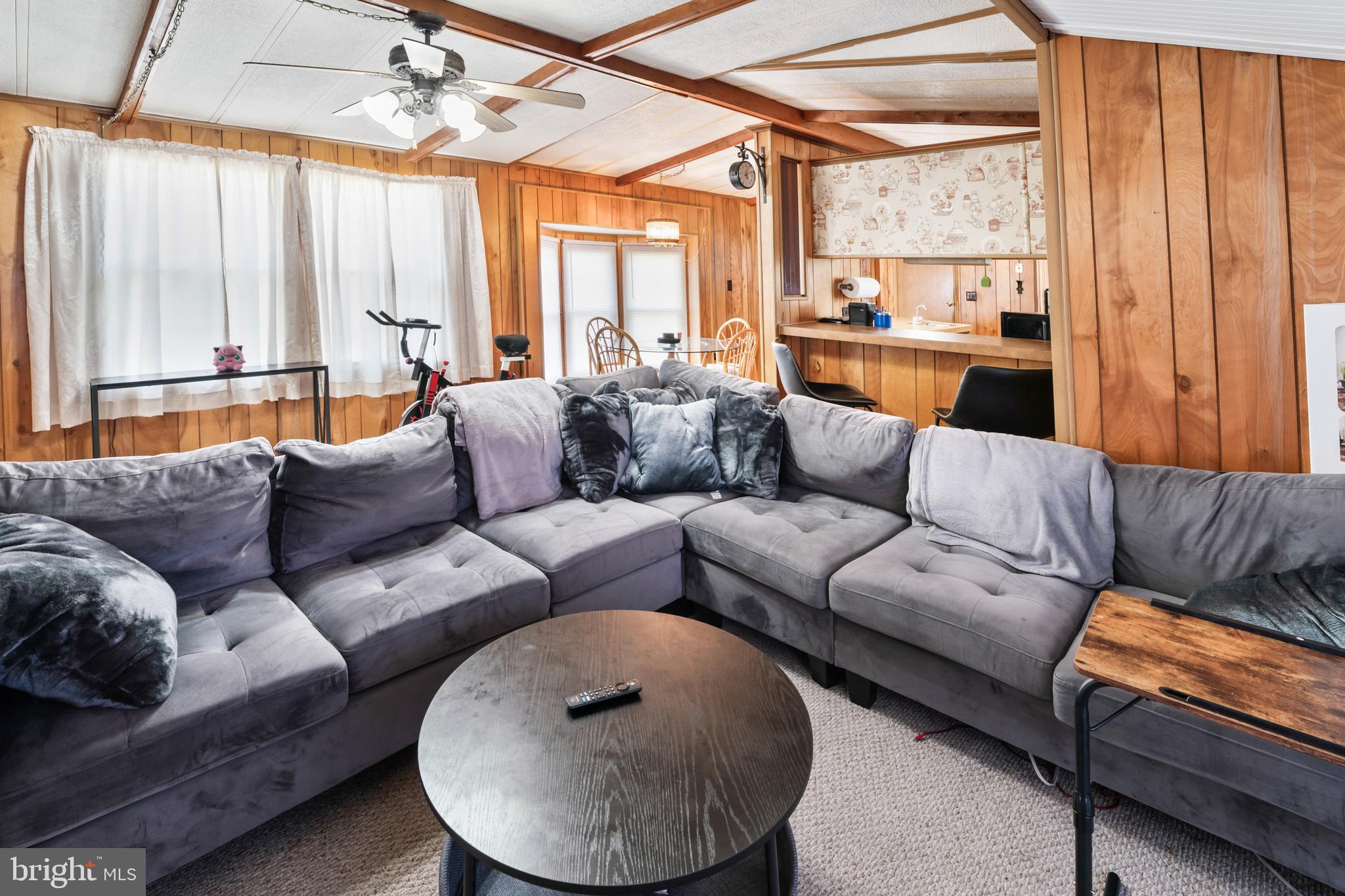 417 Captain Smith Lane Buena, NJ 08310 - Photo 11 of 31 a living room with furniture and a large window