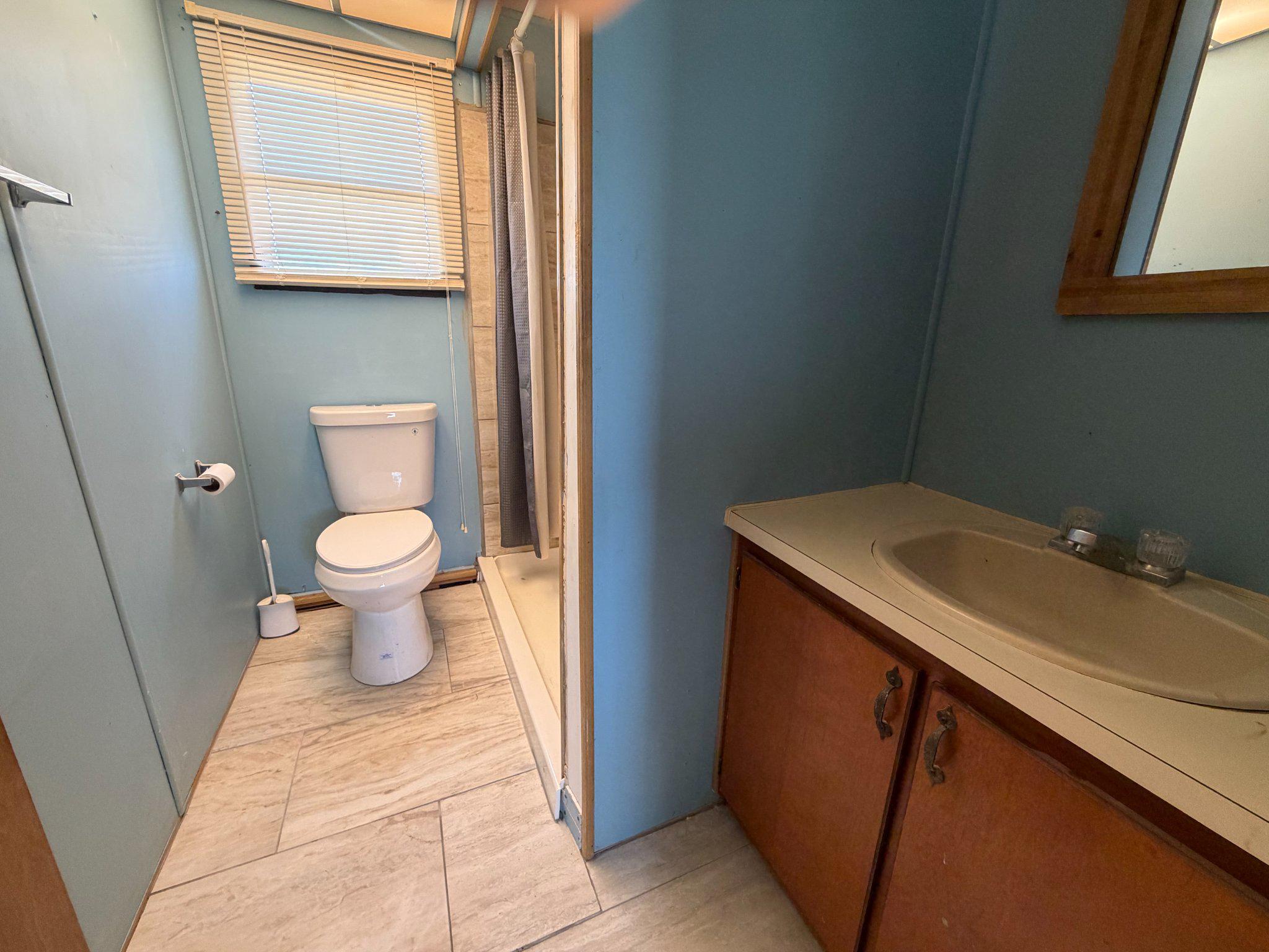 417 Captain Smith Lane Buena, NJ 08310 - Photo 16 of 25 a bathroom with a sink and a toilet