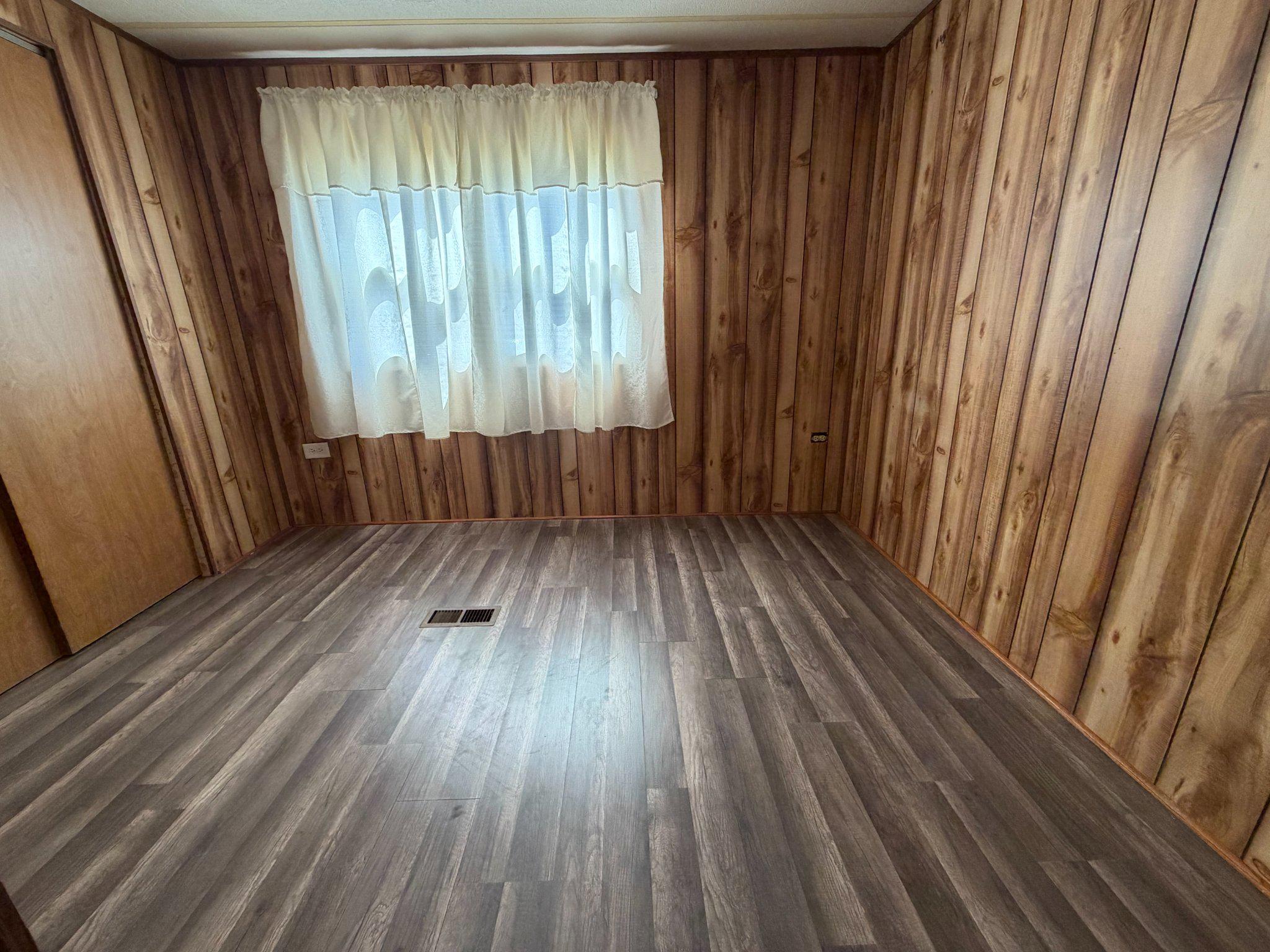 417 Captain Smith Lane Buena, NJ 08310 - Photo 20 of 25 a view of backyard with hardwood and window