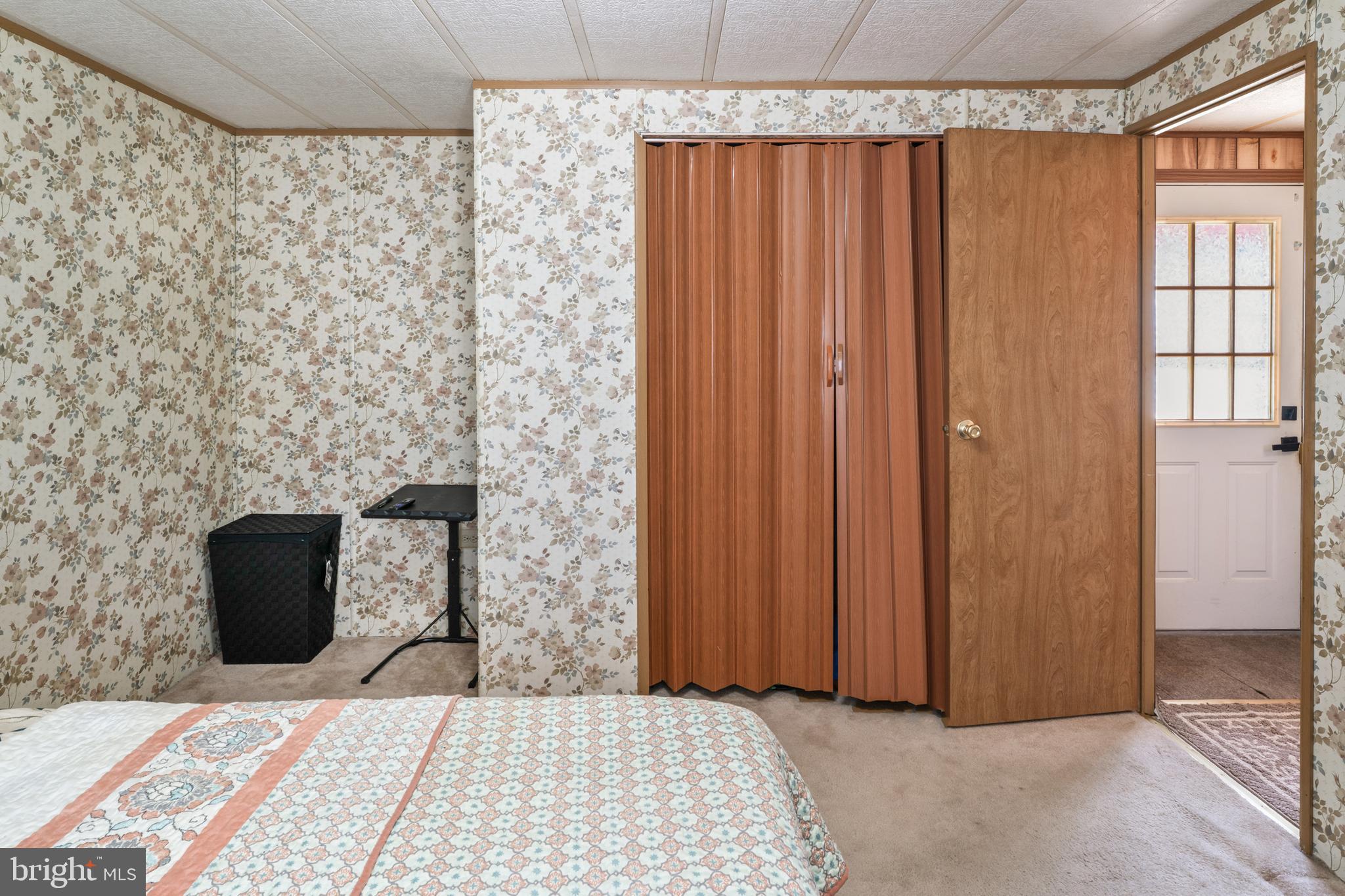 417 Captain Smith Lane Buena, NJ 08310 - Photo 26 of 31 a bedroom with a bed and a window