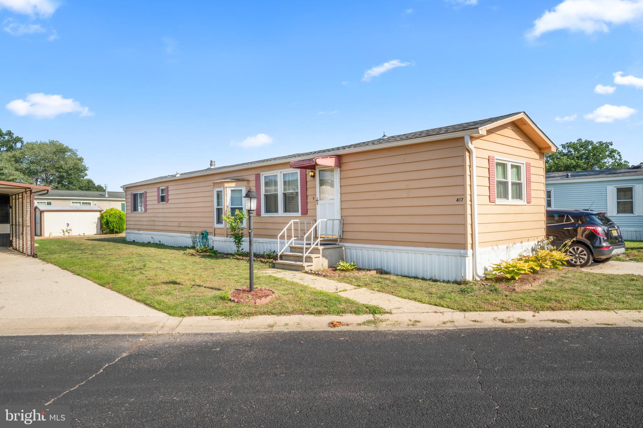 417 Captain Smith Lane Buena, NJ 08310 - Photo 3 of 31 a view of a house with a patio