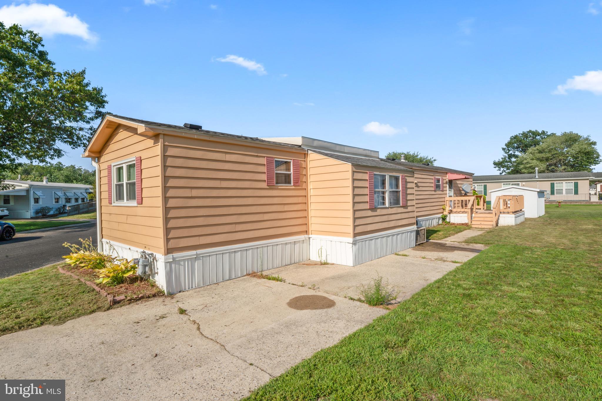 417 Captain Smith Lane Buena, NJ 08310 - Photo 4 of 31 a front view of a house with garden