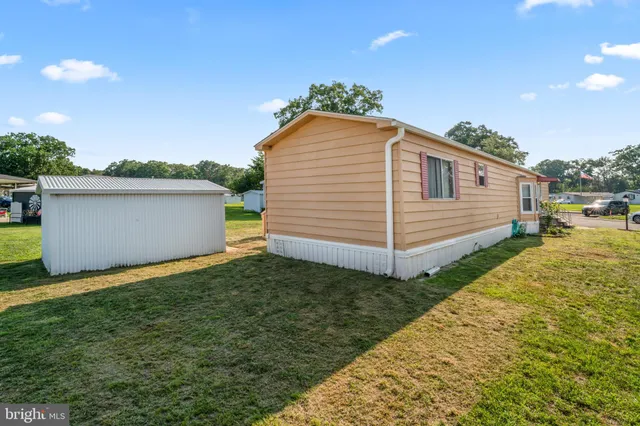 a view of a backyard with a garden