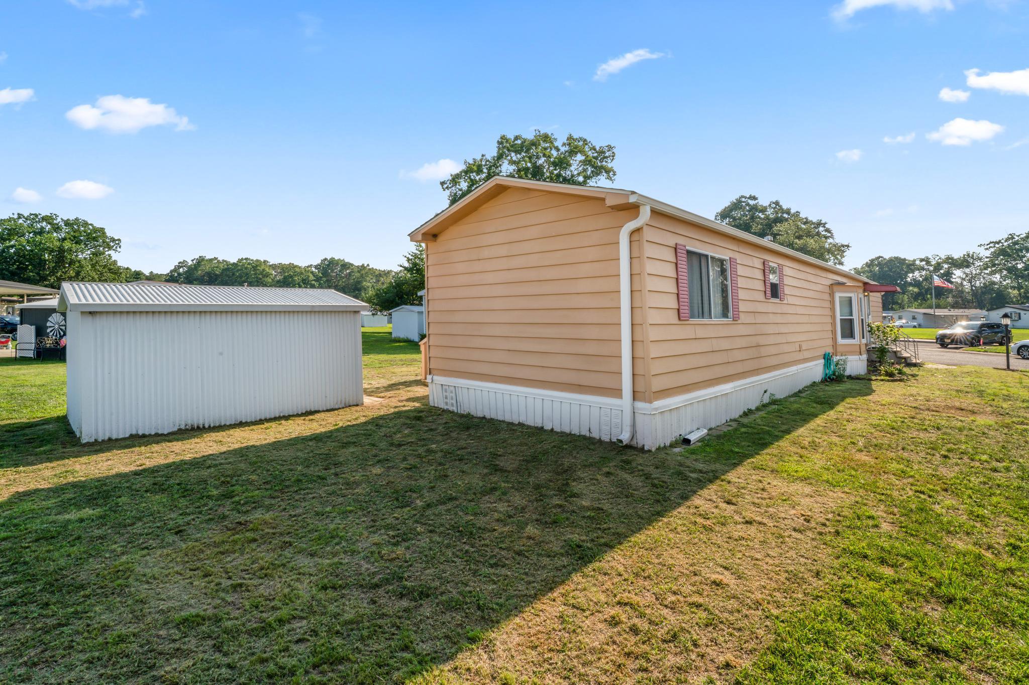 417 Captain Smith Lane Buena, NJ 08310 - Photo 7 of 25 a view of a backyard with a garden