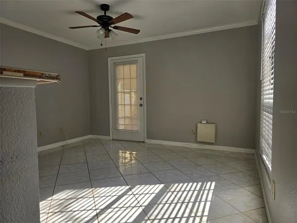 a view of an empty room and window