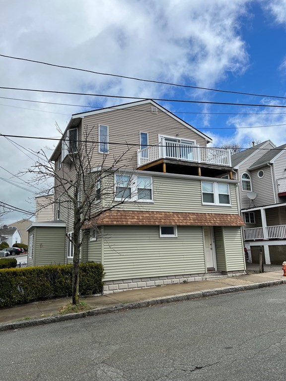 150 Locust Street, Unit 1 Winthrop, MA 02152 - Photo 1 of 11 a view of house and outdoor space