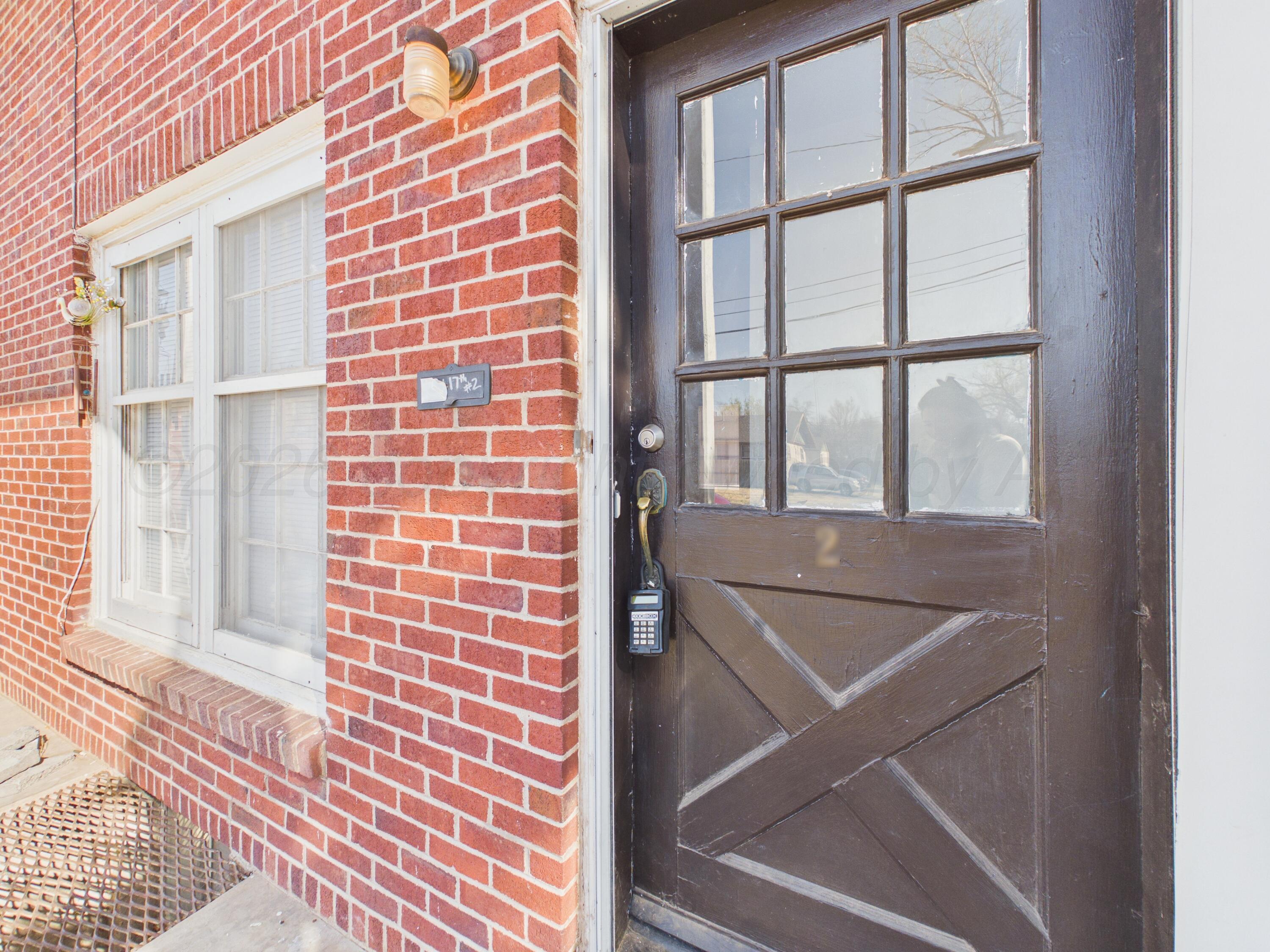 412 Southwest 17th Avenue Amarillo, TX 79102 - Photo 3 of 22 a view of a door and a window