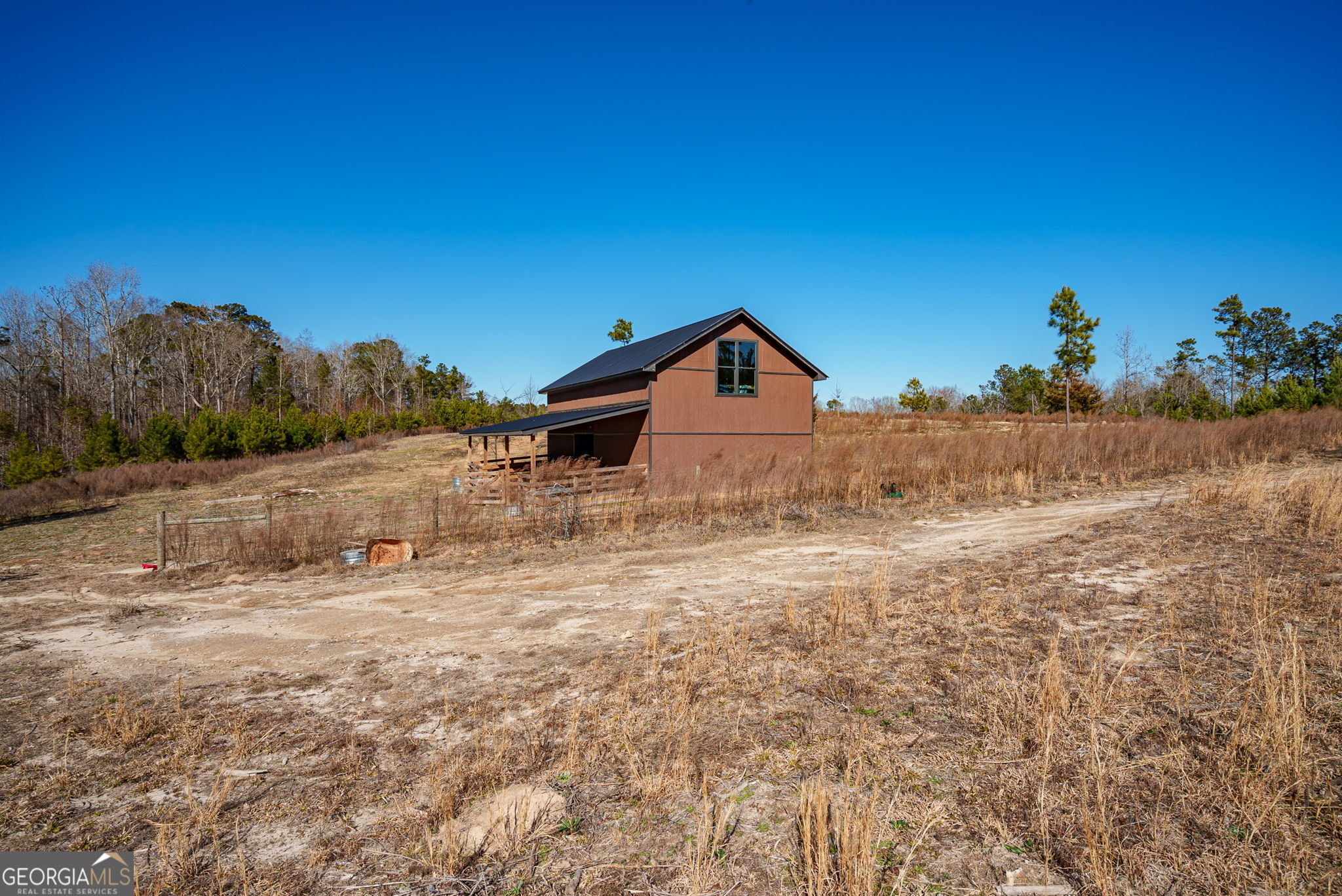 0 Warren Road White Plains, GA 30678 - Photo 33 of 37 a view of a house with a yard