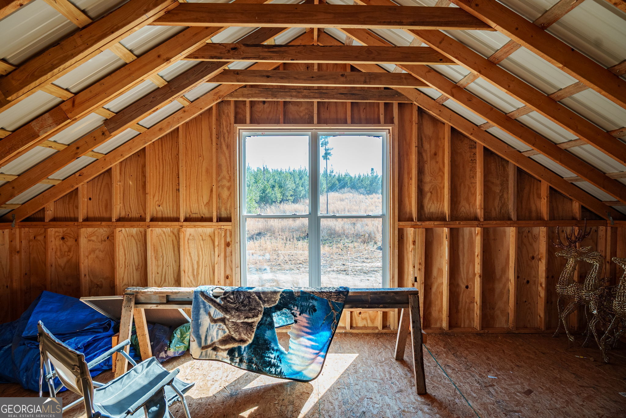 0 Warren Road White Plains, GA 30678 - Photo 37 of 37 a living room with furniture and a window