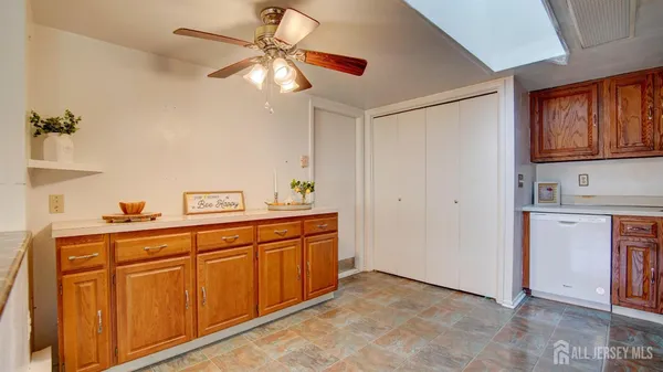 a view of a kitchen with electric appliances