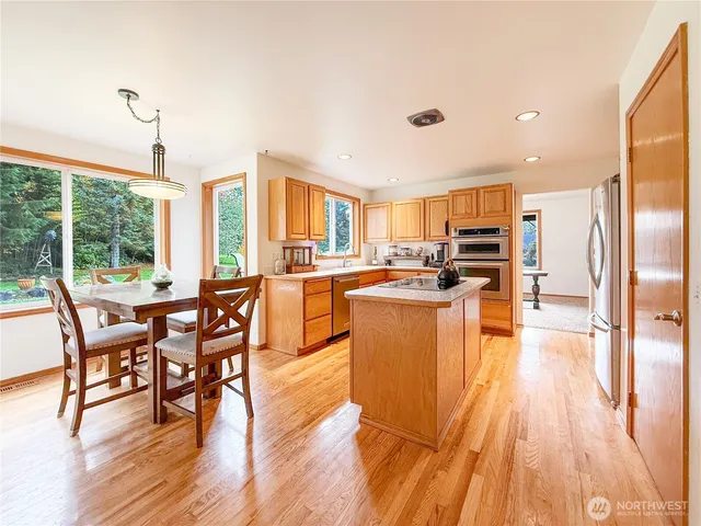 a view of a hallway with entryway door