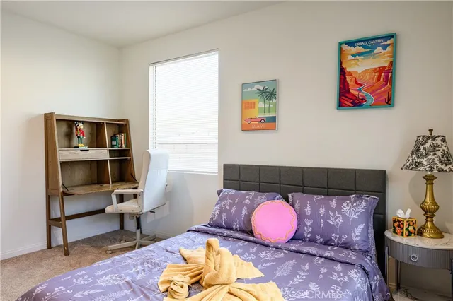 a kitchen with sink a counter top space and stainless steel appliances