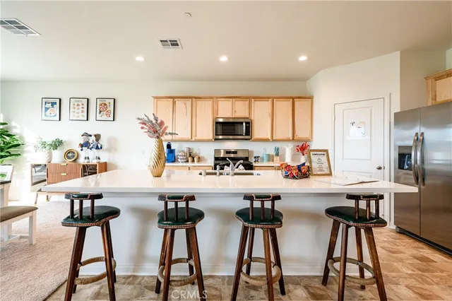 a view of a dining room with furniture