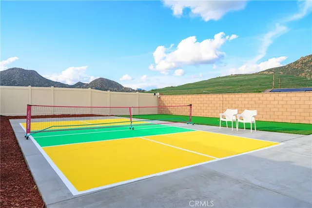 a view of an outdoor space pool patio and living room