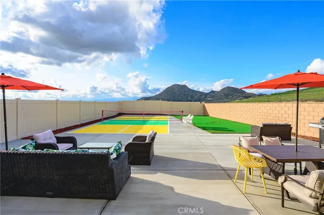 a bedroom with furniture and a window