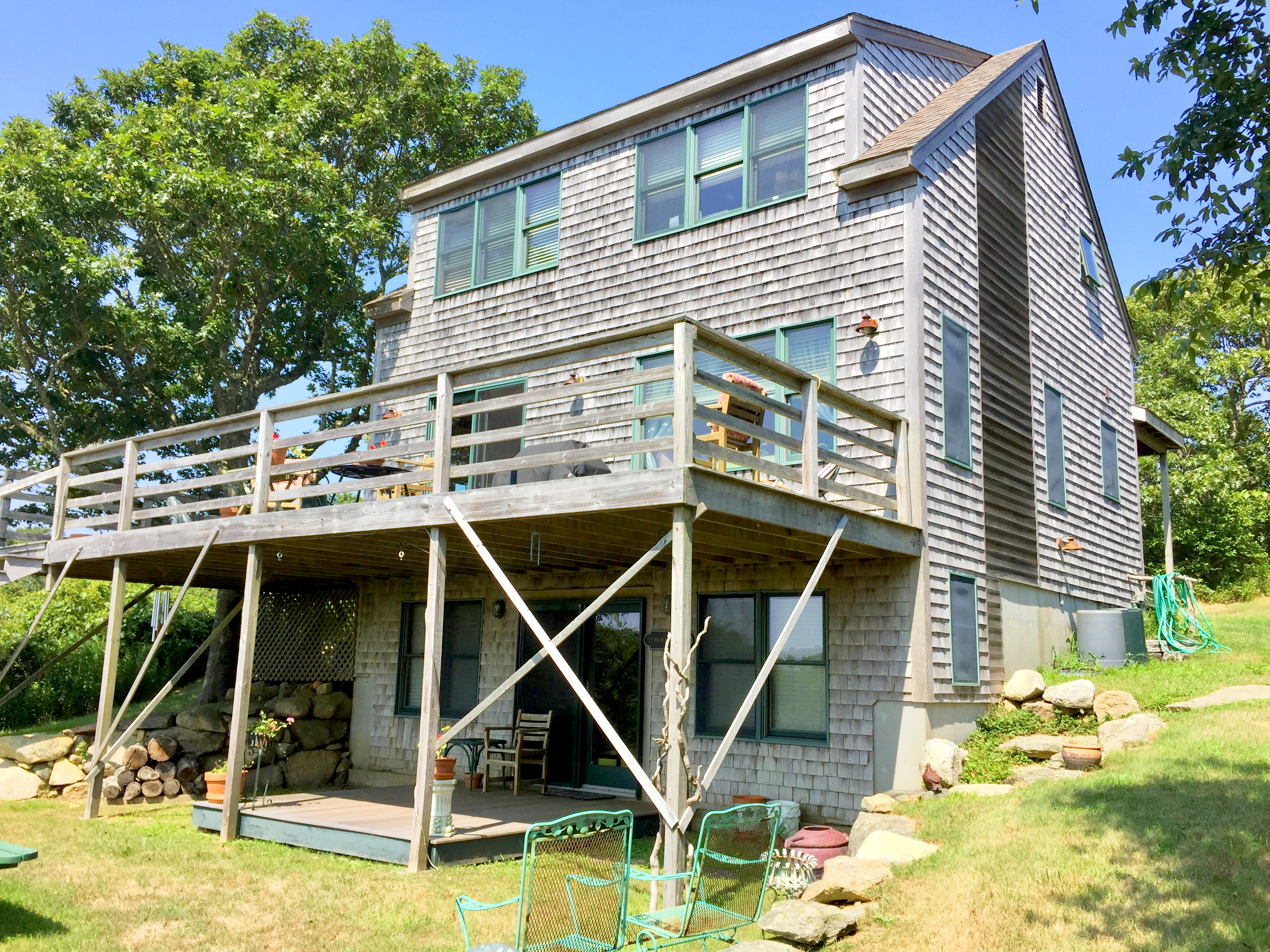 4 Raymonds Way Aquinnah, MA 02535 - Photo 2 of 20 a view of a house with backyard