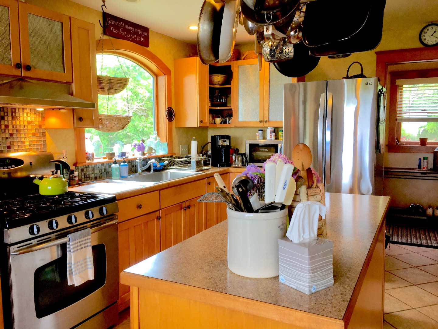 4 Raymonds Way Aquinnah, MA 02535 - Photo 6 of 20 a kitchen with stainless steel appliances granite countertop a sink and a stove