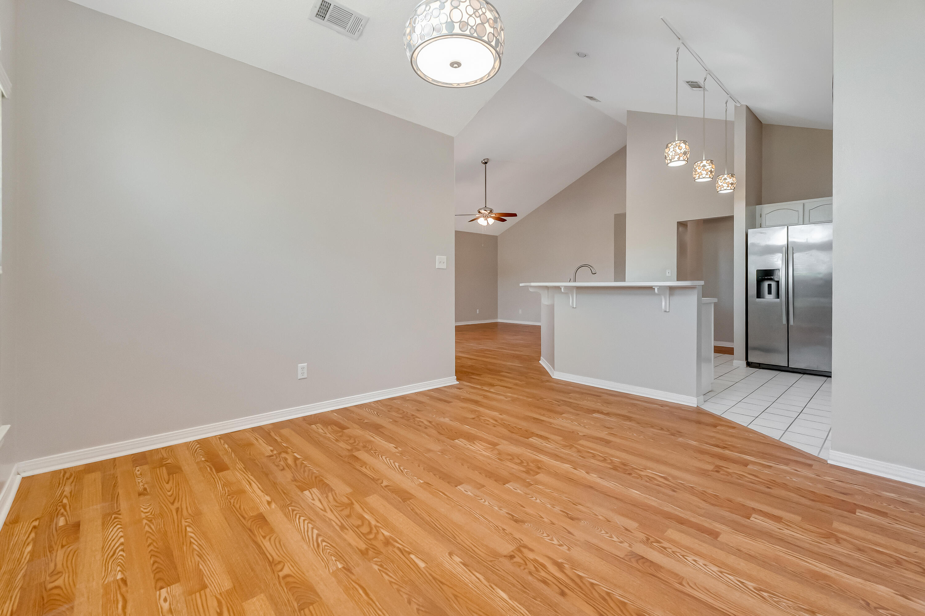 901 Shalimar Cove Shalimar, FL 32579 - Photo 13 of 63 a view of empty room with wooden floor