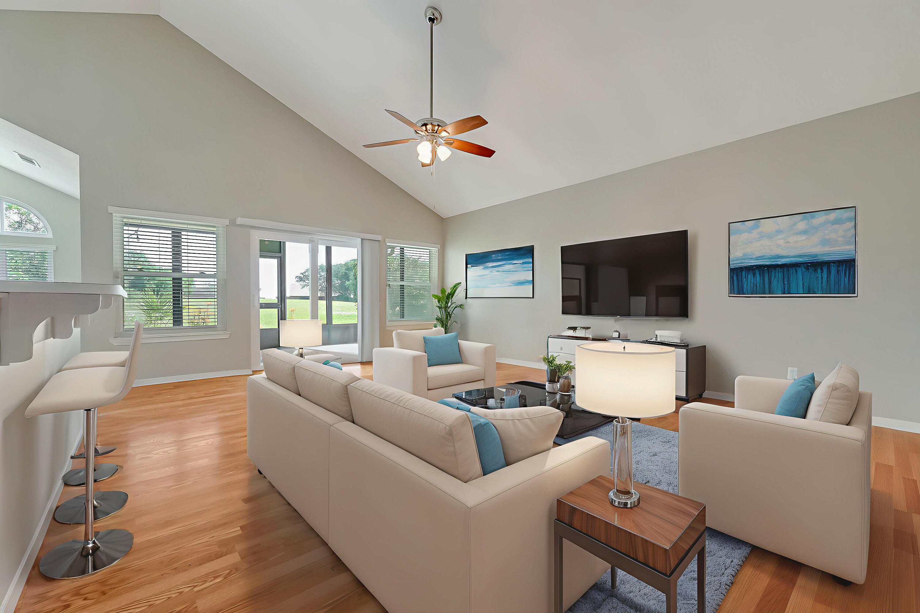 901 Shalimar Cove Shalimar, FL 32579 - Photo 25 of 63 a living room with furniture and a flat screen tv