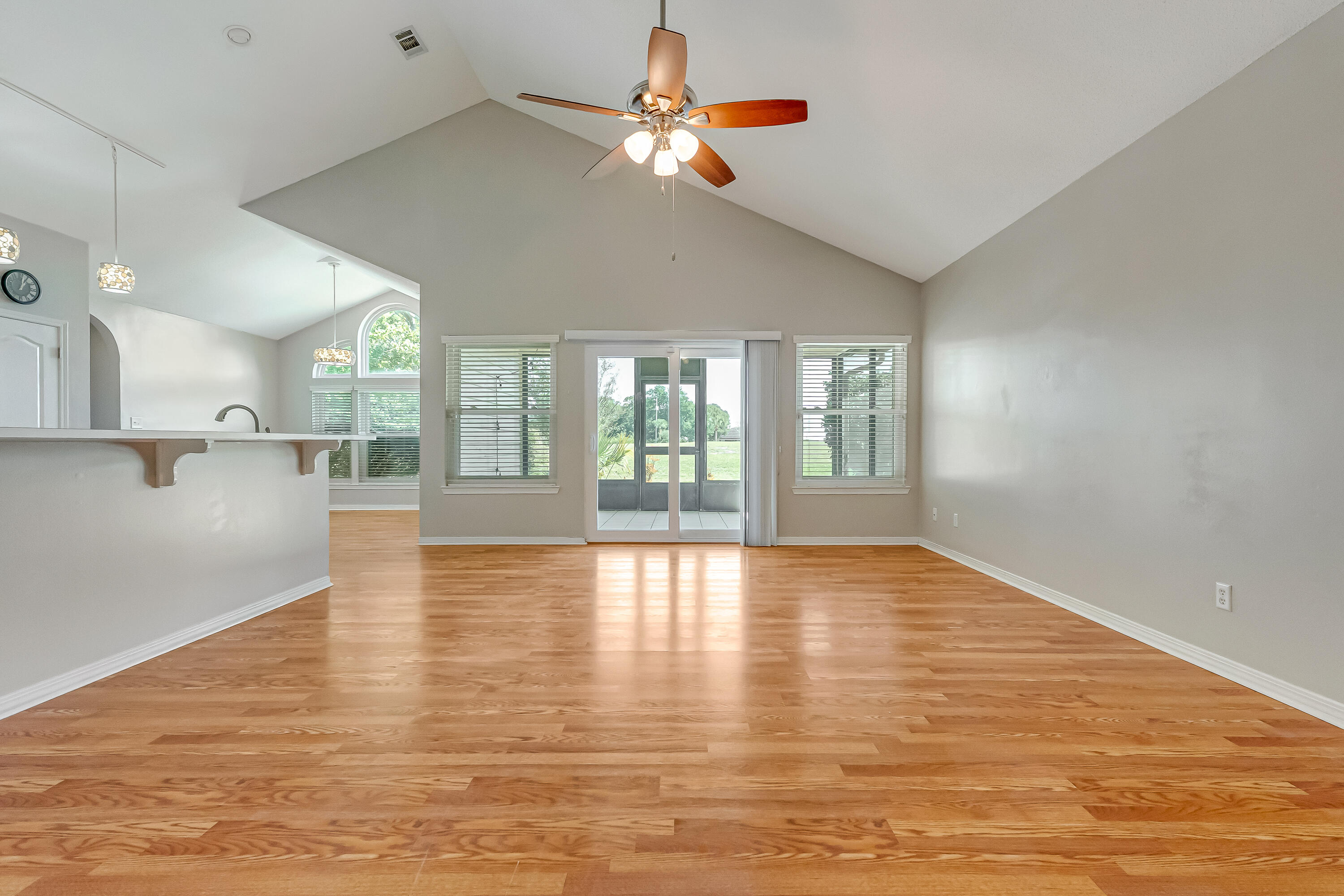 901 Shalimar Cove Shalimar, FL 32579 - Photo 29 of 63 a view of an empty room with window and wooden floor
