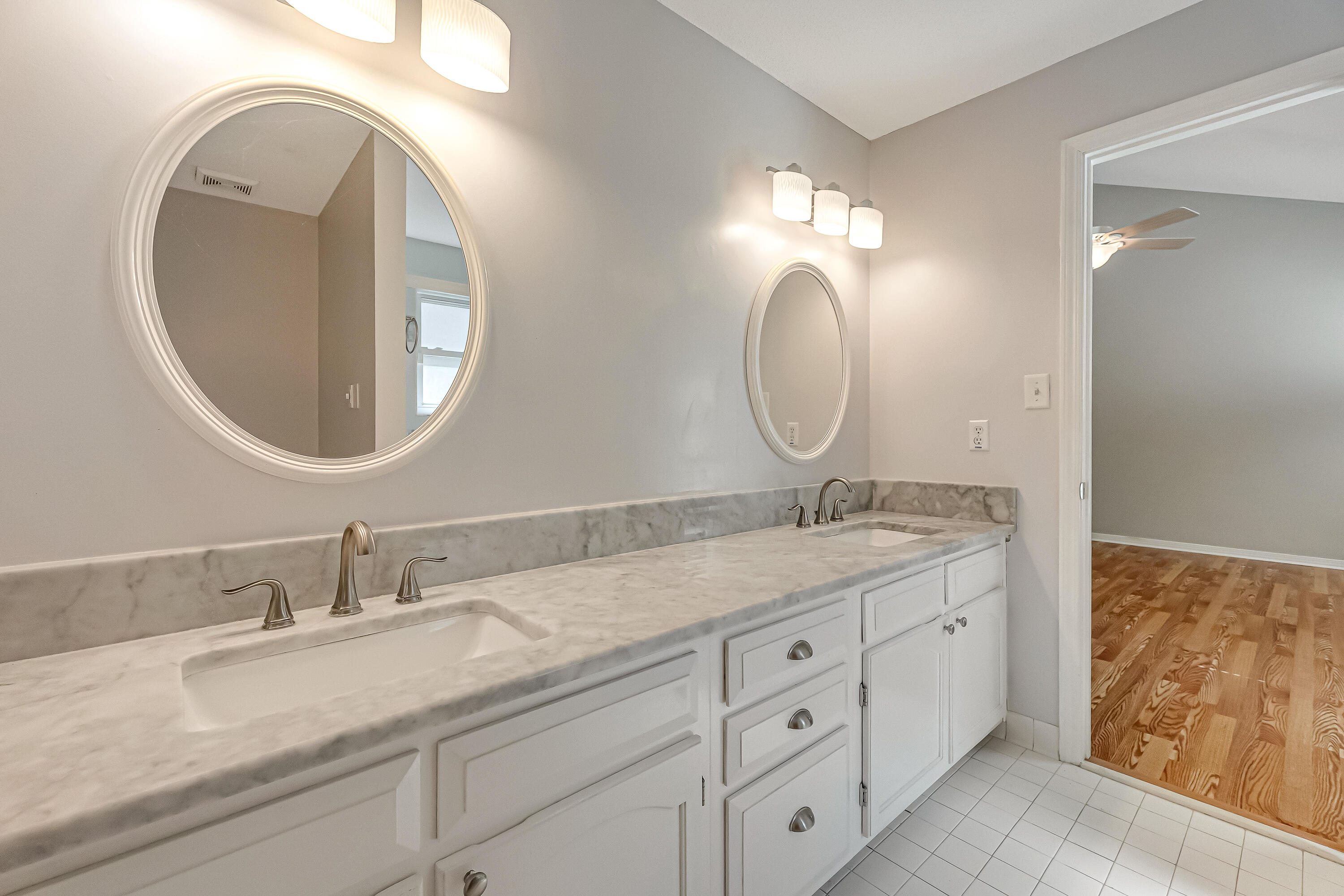 901 Shalimar Cove Shalimar, FL 32579 - Photo 36 of 63 a bathroom with 2 sink and a mirror