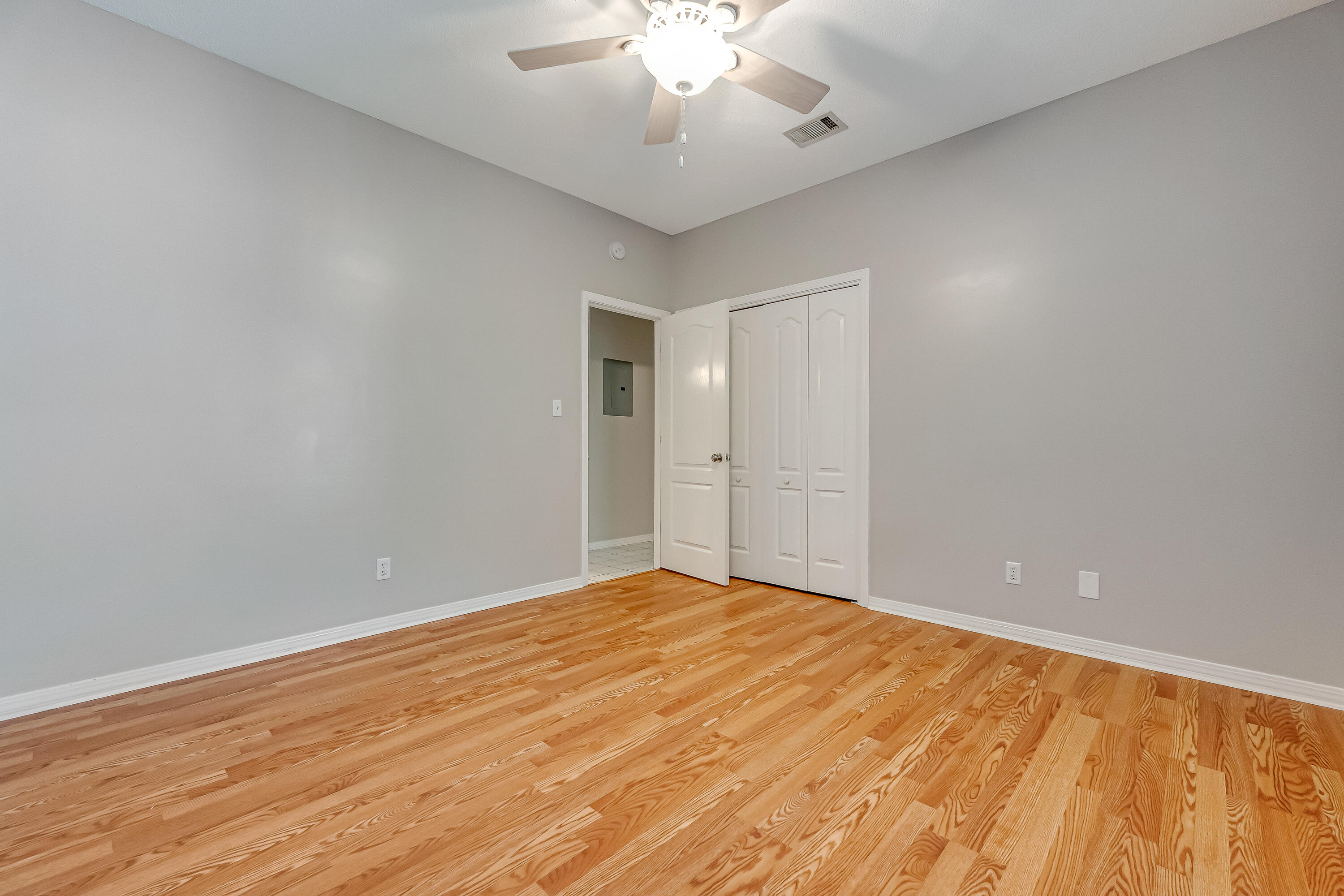 901 Shalimar Cove Shalimar, FL 32579 - Photo 44 of 63 a view of an empty room with a chandelier fan