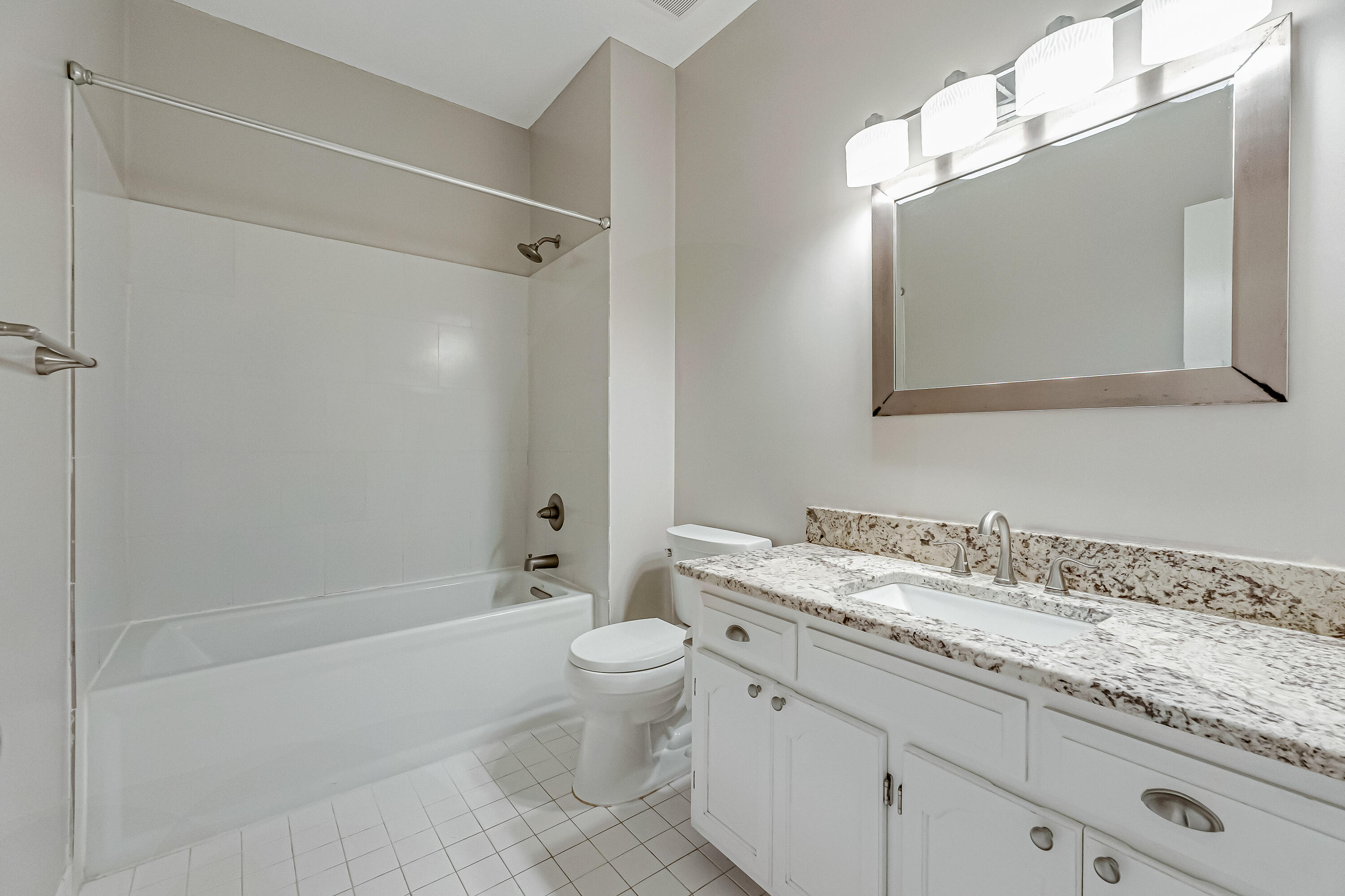 901 Shalimar Cove Shalimar, FL 32579 - Photo 45 of 63 a bathroom with a granite countertop sink a toilet and bathtub