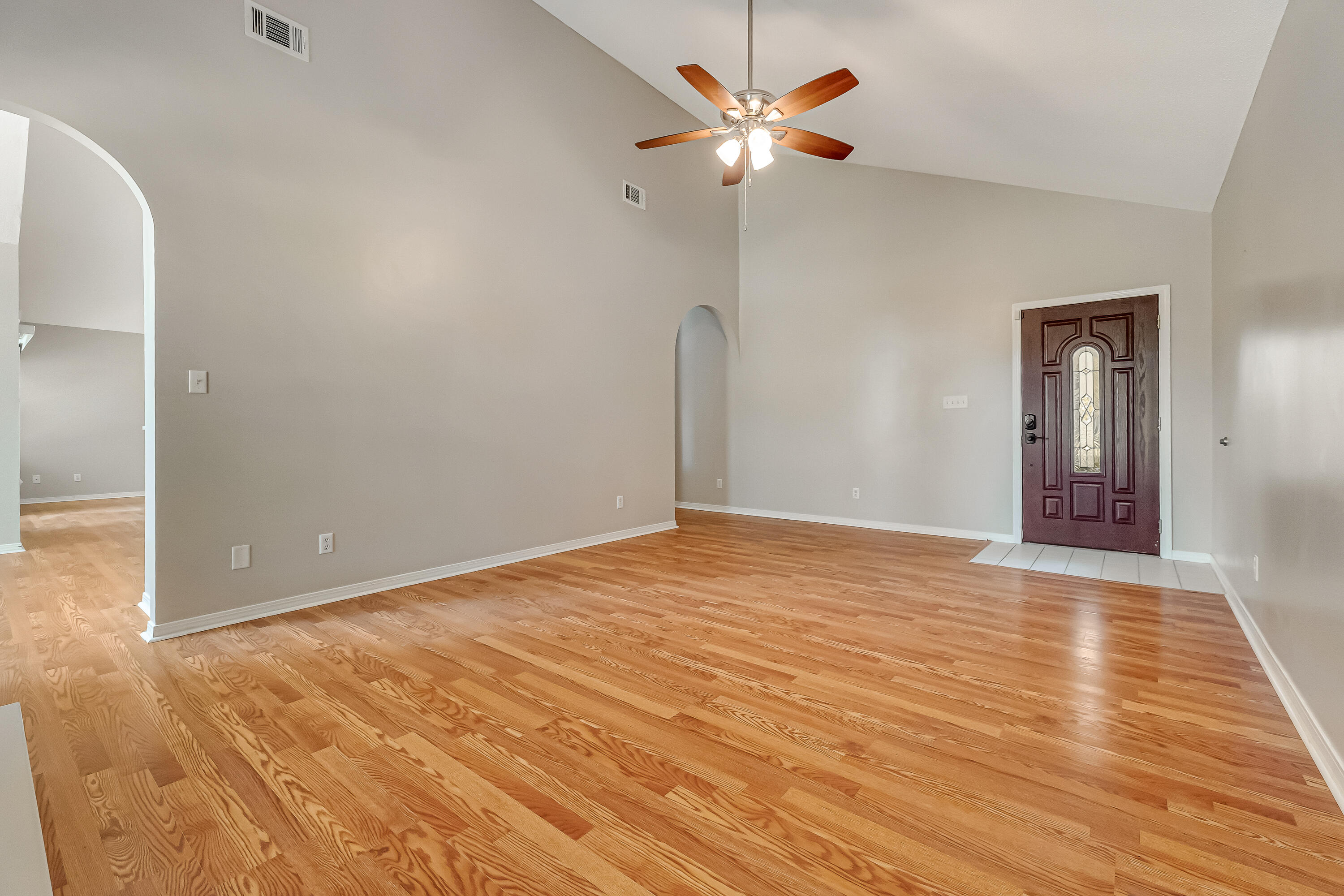 901 Shalimar Cove Shalimar, FL 32579 - Photo 9 of 63 a view of an empty room with wooden floor