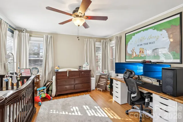 a bed room with furniture and a window