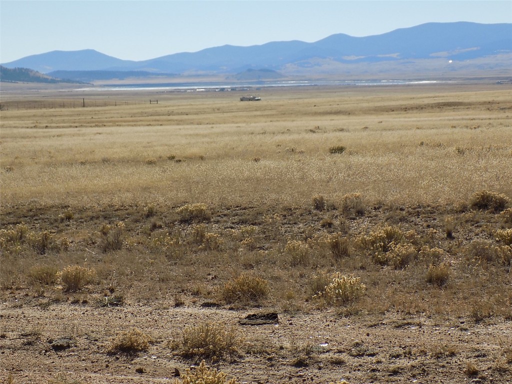 3685 Routt Road Hartsel, CO 80449 - Photo 1 of 10 a view of an ocean and a mountain