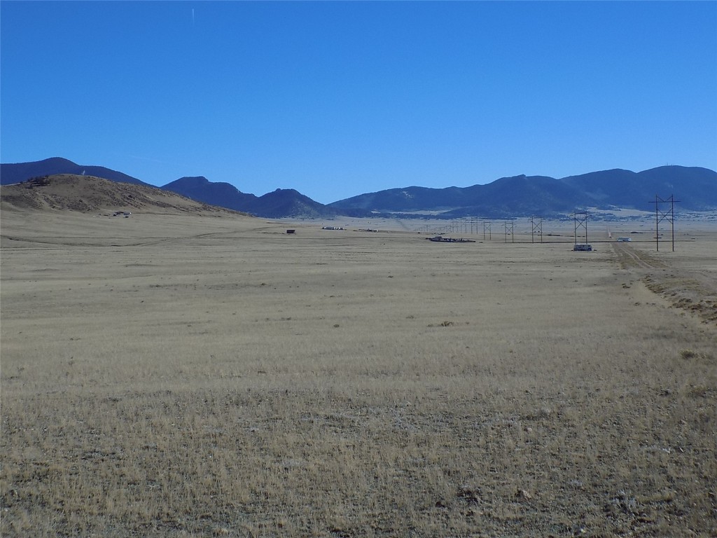 3685 Routt Road Hartsel, CO 80449 - Photo 2 of 10 a view of an ocean and a mountain