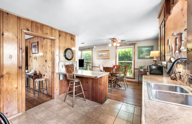 a view of a living room and dining room