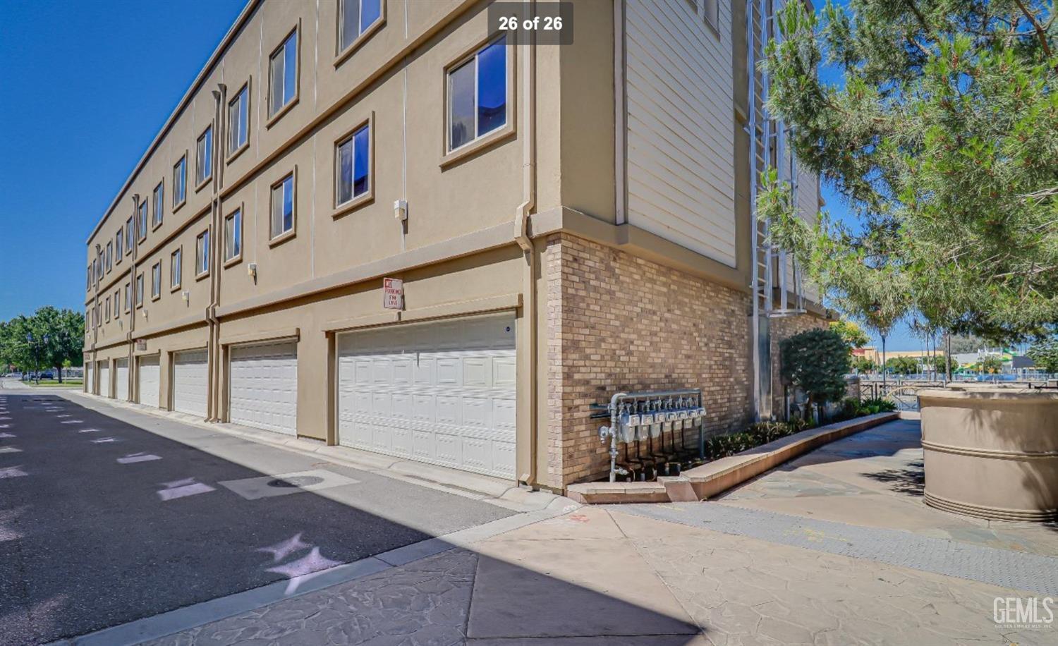 Undisclosed Address Bakersfield, CA 93304 - Photo 19 of 19 a front view of a building with yard