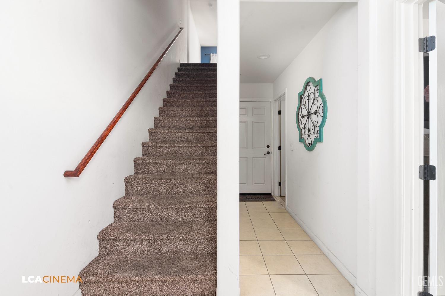 Undisclosed Address Bakersfield, CA 93304 - Photo 8 of 19 a view of an entryway with stairs