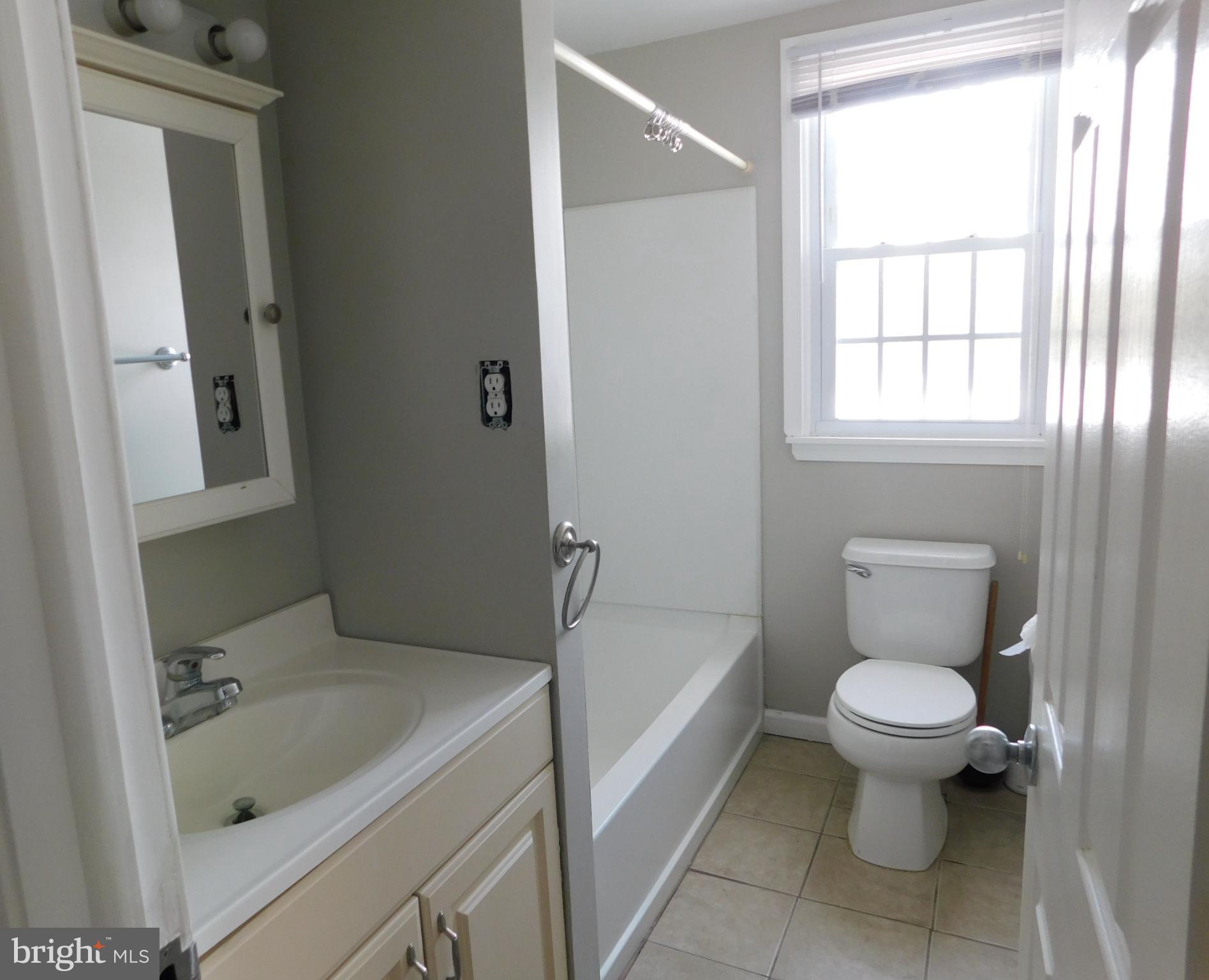 737 Churchville Road Southampton, PA 18966 - Photo 4 of 10 a bathroom with a toilet sink and bathtub