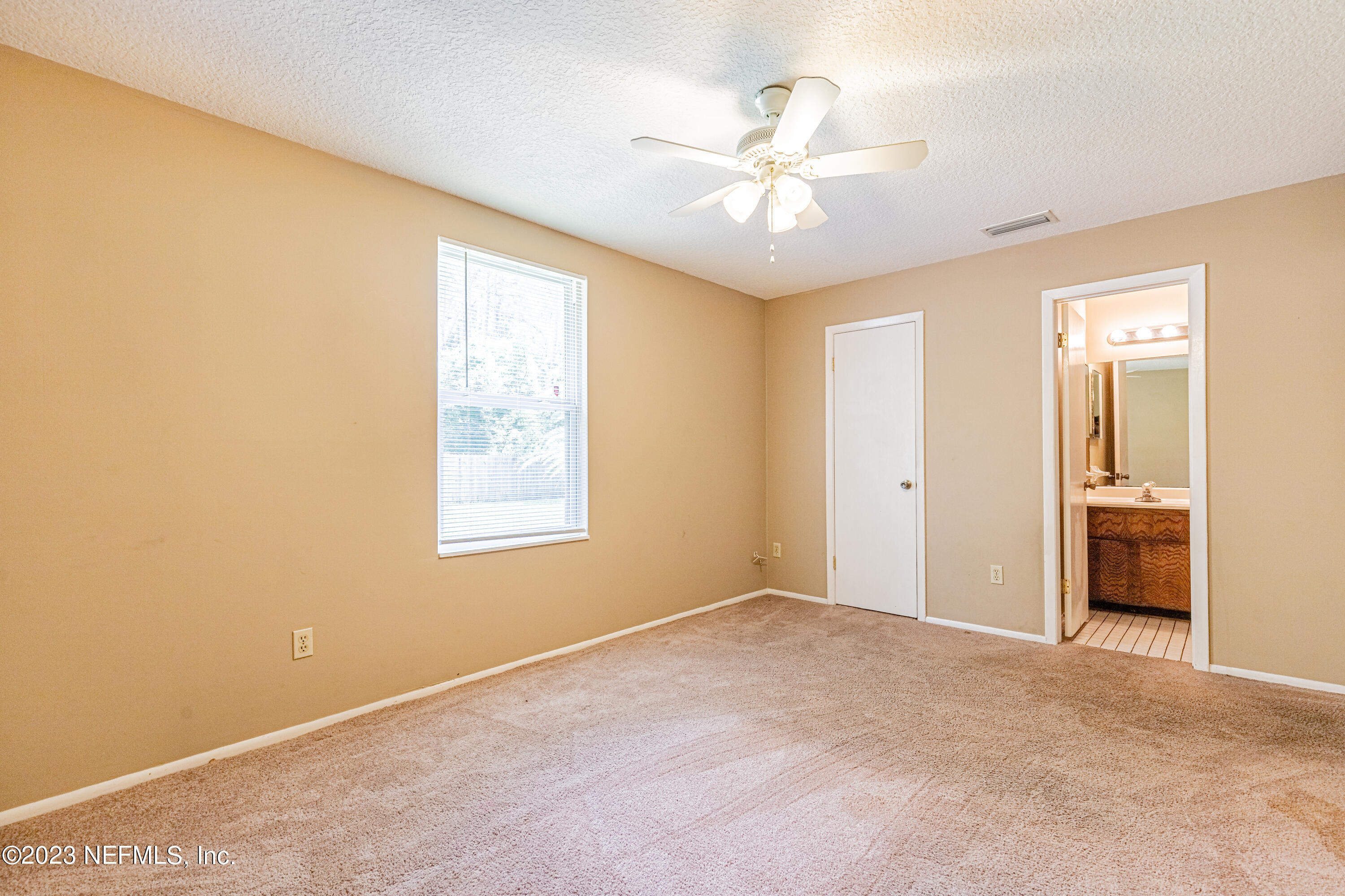 2833 Homestead Road Orange Park, FL 32065 - Photo 13 of 28 a view of an empty room with a window