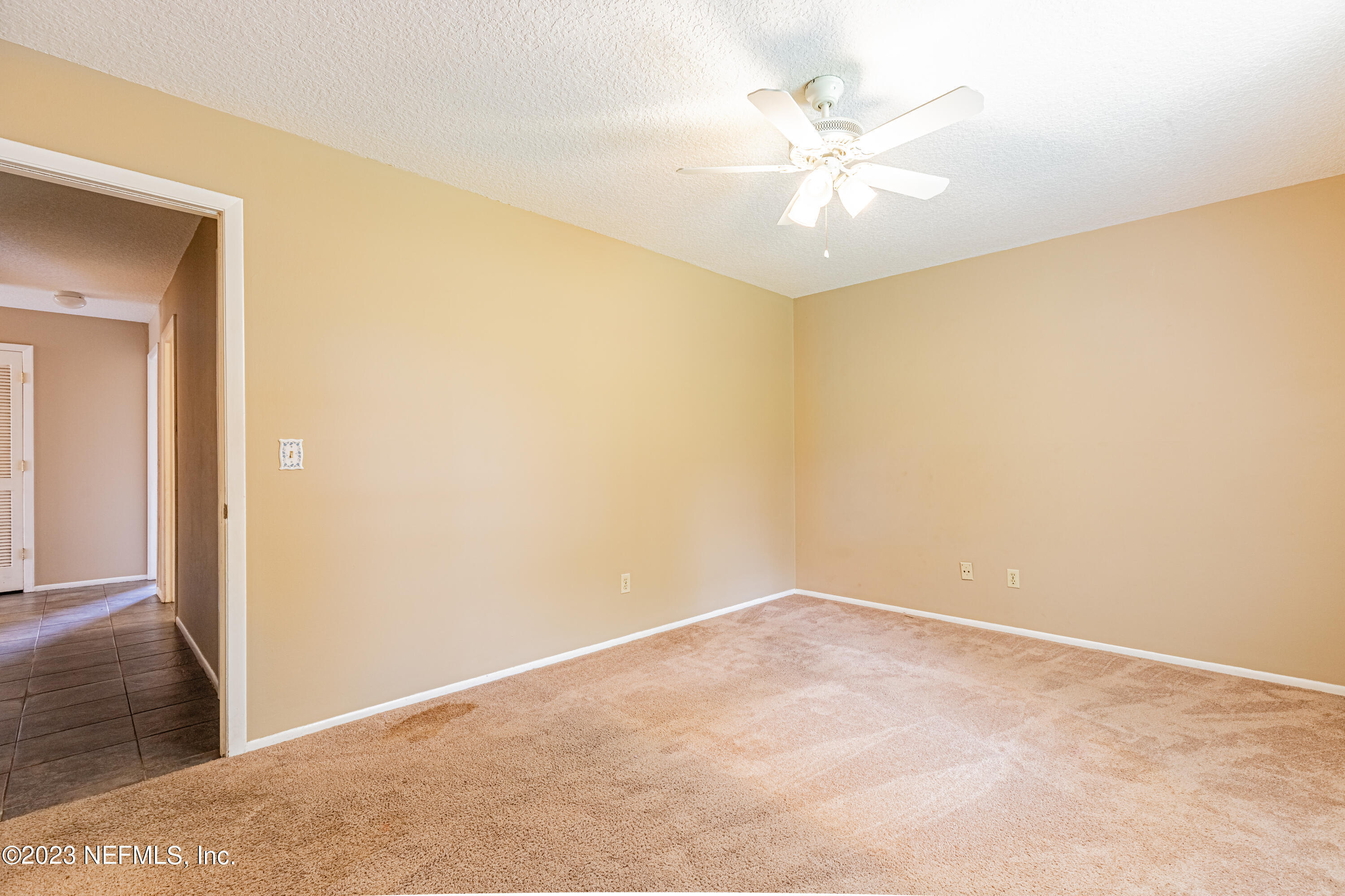 2833 Homestead Road Orange Park, FL 32065 - Photo 15 of 28 a view of a room with a ceiling fan