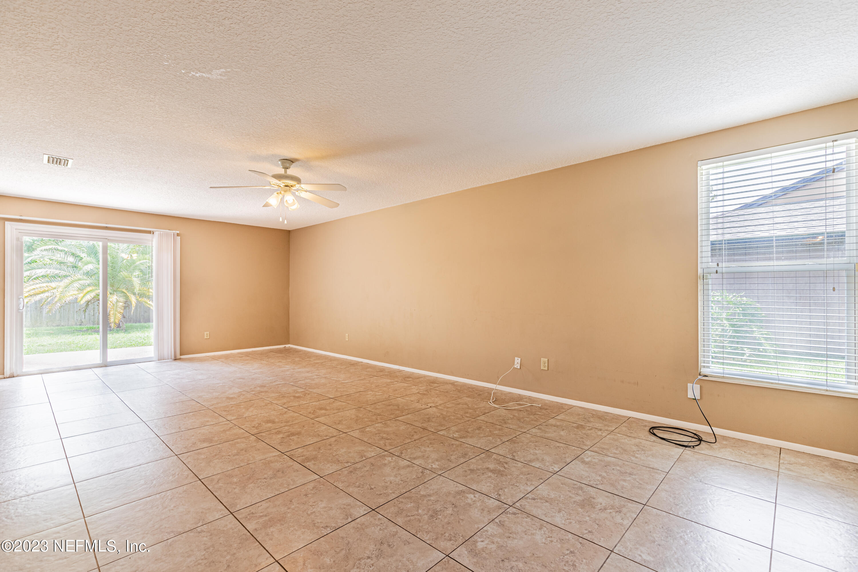 2833 Homestead Road Orange Park, FL 32065 - Photo 3 of 28 a view of an empty room with a window