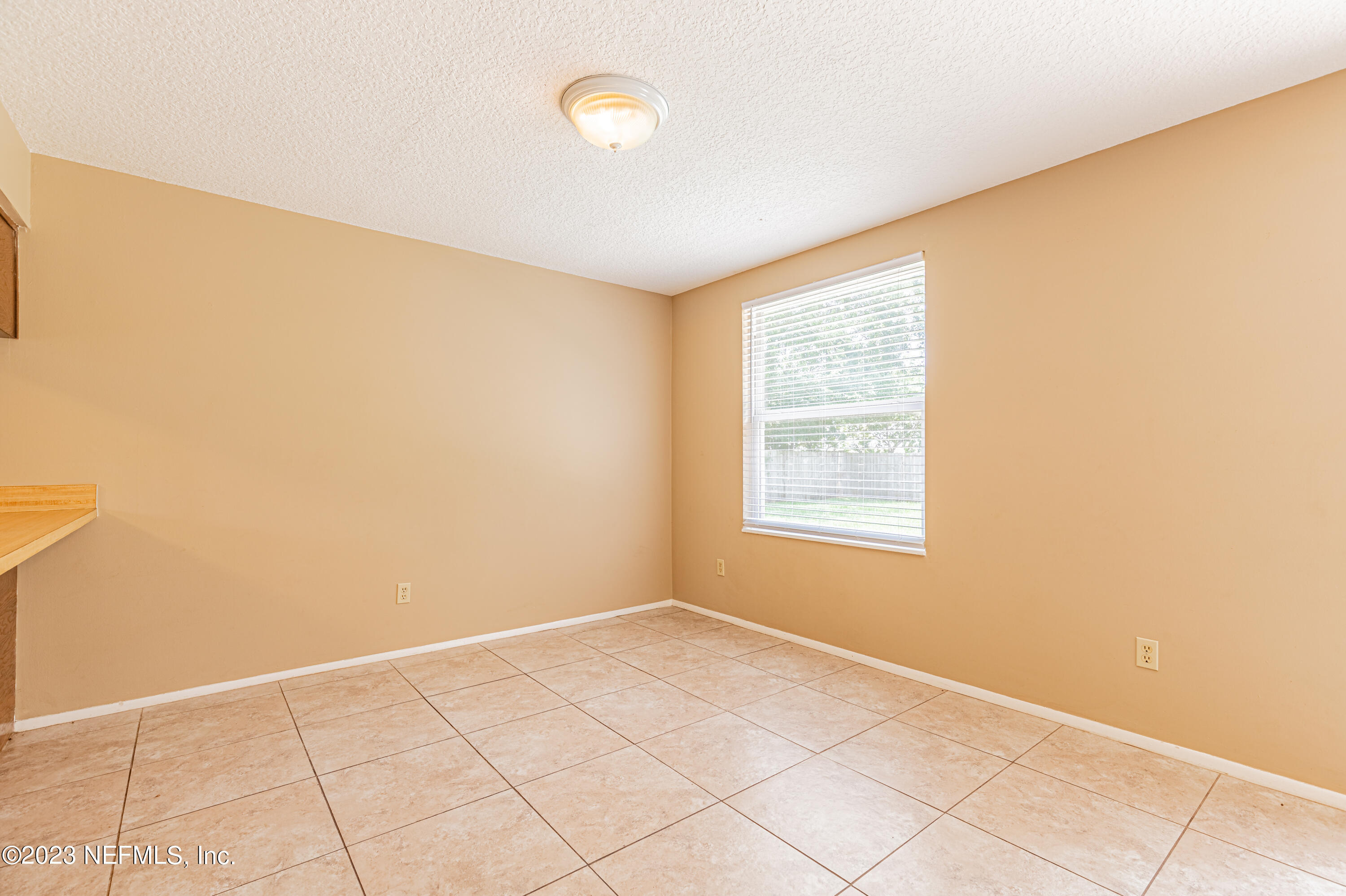 2833 Homestead Road Orange Park, FL 32065 - Photo 7 of 28 a view of an empty room and window