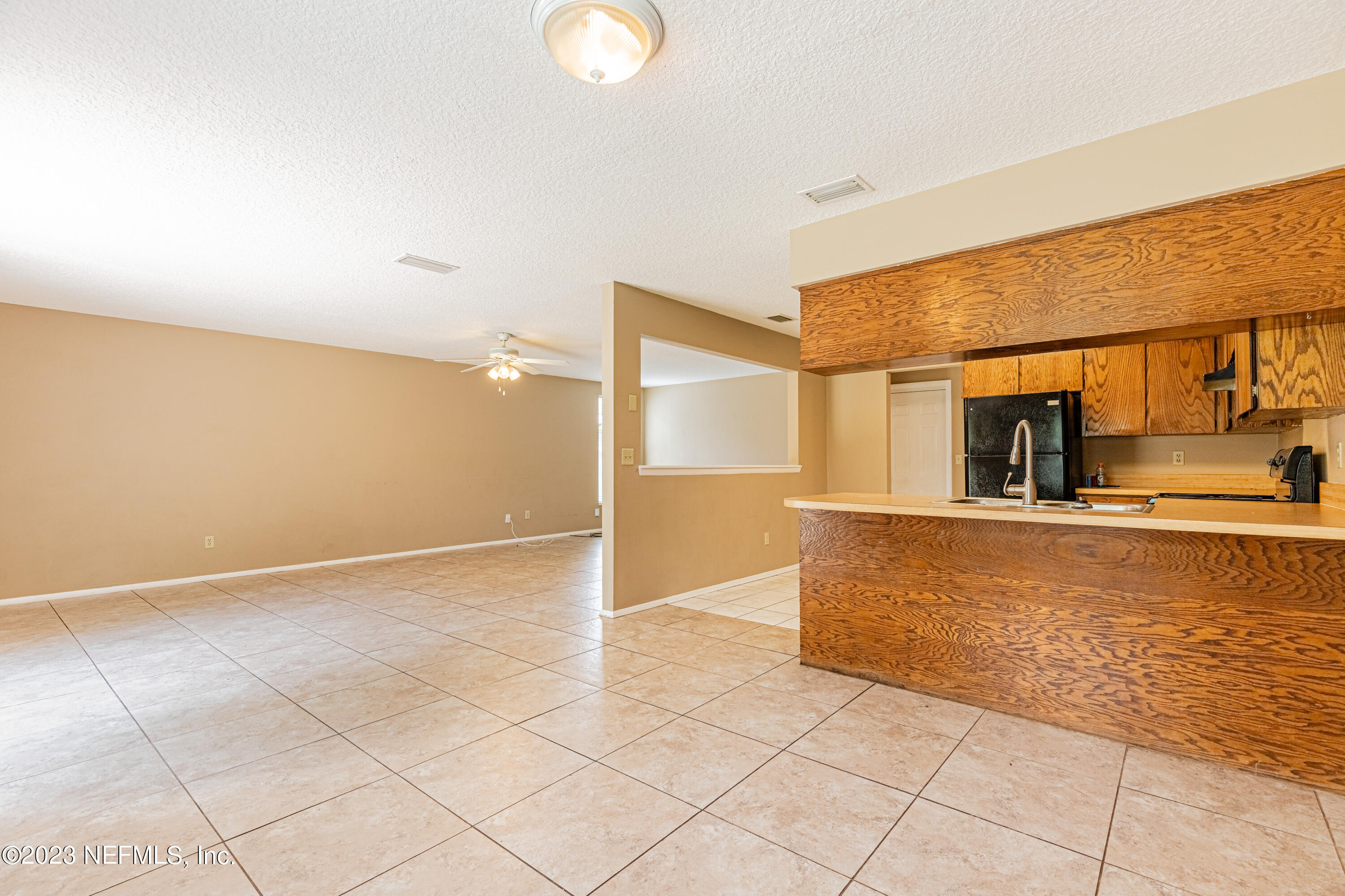 2833 Homestead Road Orange Park, FL 32065 - Photo 8 of 28 a view of kitchen with furniture and window